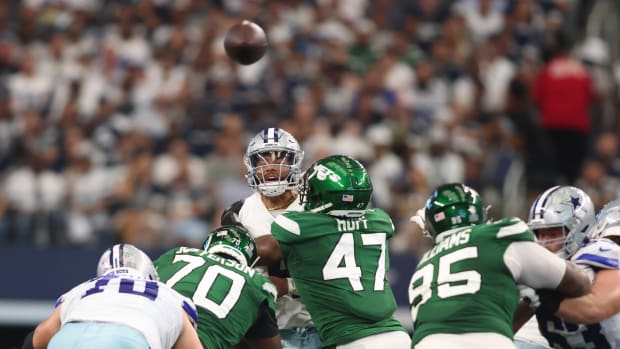 Jets' DE Bryce Huff (47) pressures Dak Prescott